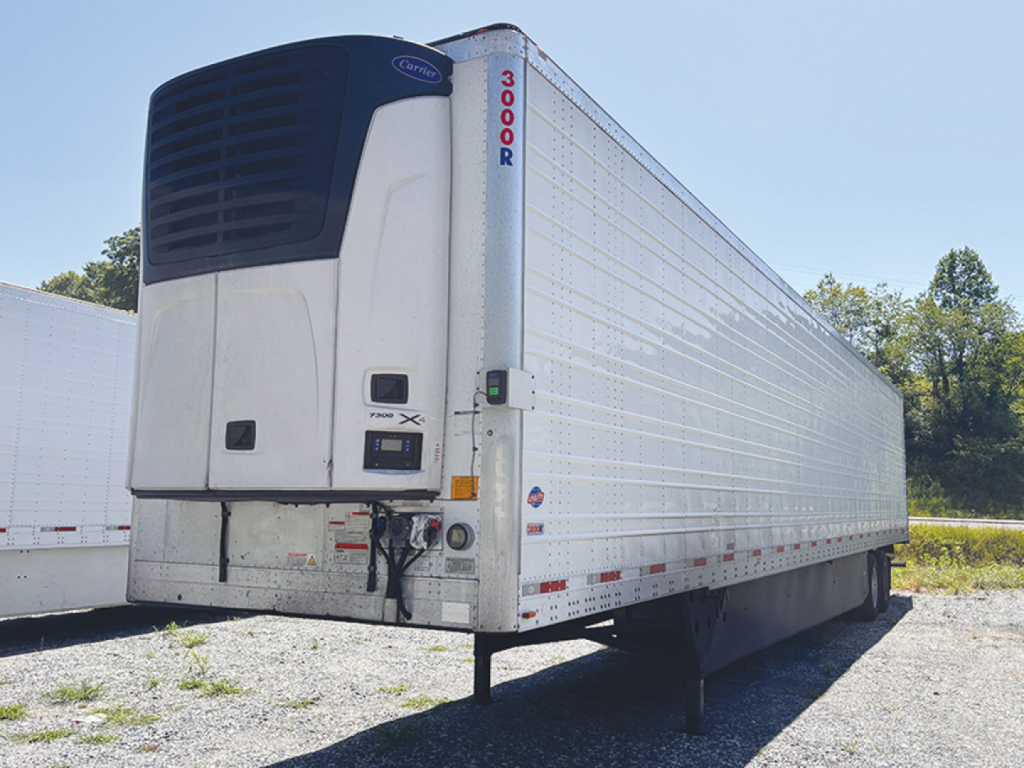 Utility Reefer trailer 3000R side view showing Thermo King unit and vertical 3000R text on nose
