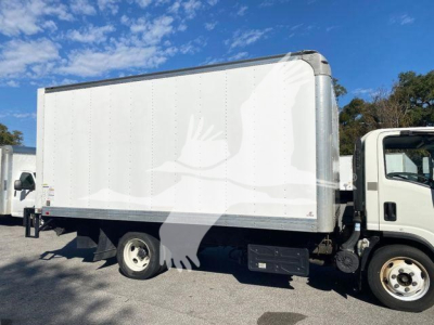 Isuzu NPR box truck side view showing cargo box with blank white surface and gull sticker graphic. No alerts or labels visible.