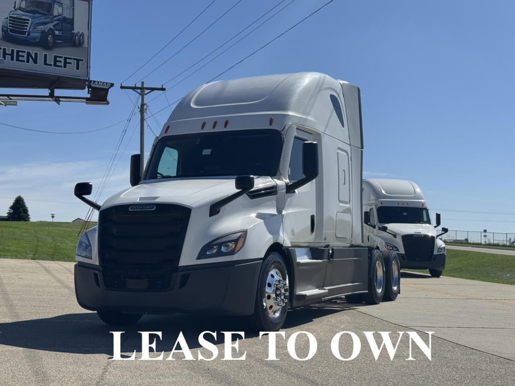 Freightliner Cascadia 126 sleeper cab tractor in white, front-left view, with another tractor in background; lease to own text overlay.