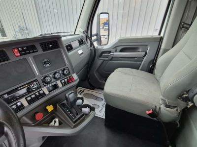 Kenworth T880 interior dash and driver seat showing center console and gear shifter