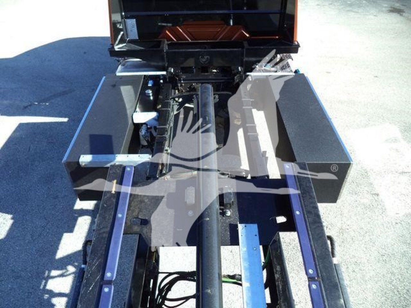 Roll-back truck chassis showing drivetrain and hydraulic components of a 2019 International 4300 rollback