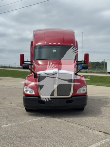 Kenworth T680 truck front view showing cab and grille.