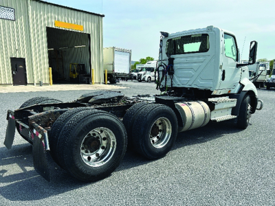 Tractor unit 2019 International RH613 truck cab and chassis shown from rear three-quarter view.