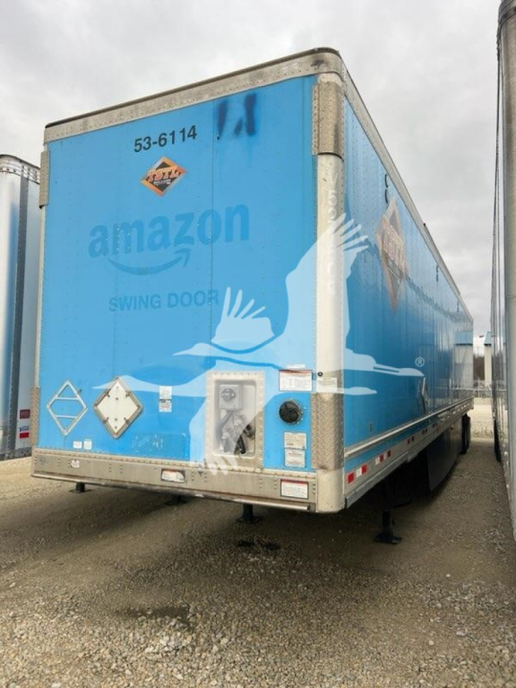 Blue Amazon Swan logo Great Dane trailer rear showing stock number 53-6114 and VIN plate.