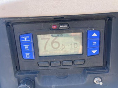 Trailer tender control panel showing digital readout 76.5 with blue arrow buttons and Start/Stop Diesel labels.