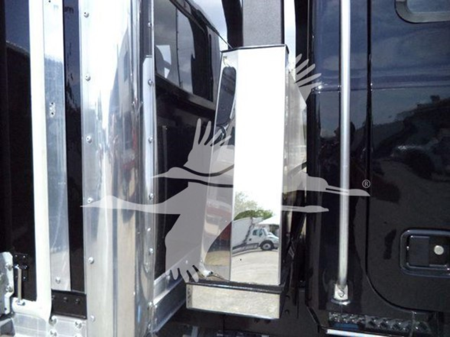 Mack MD6 truck cab exterior with chrome side mirror housing and steps visible