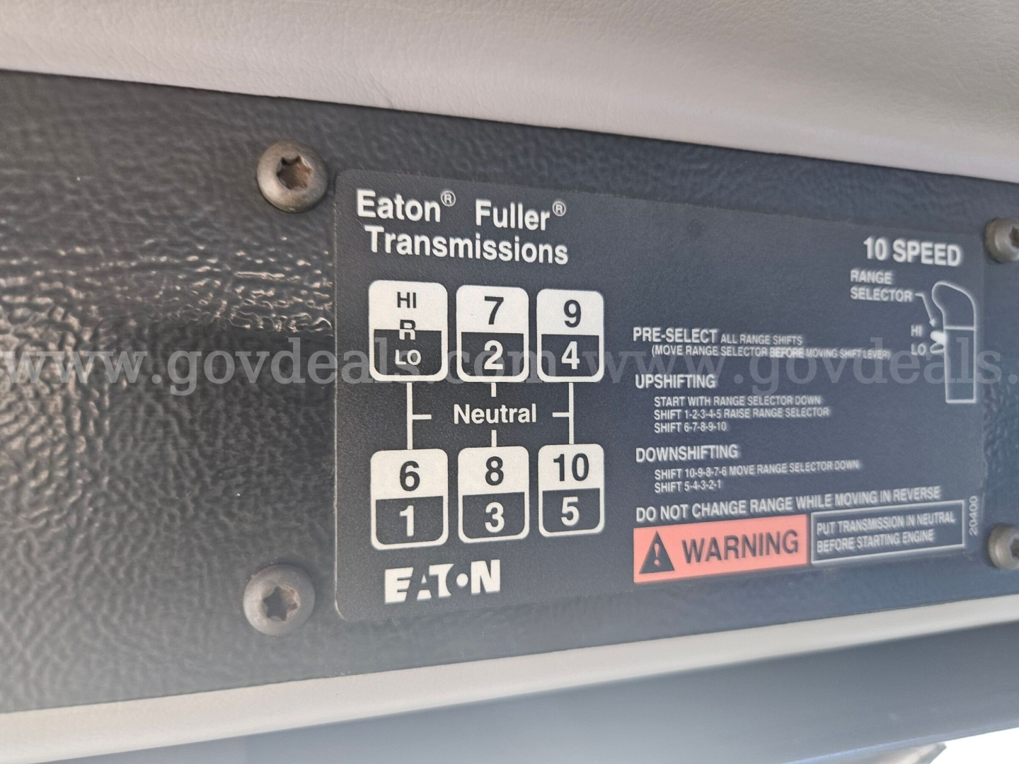 Eaton Fuller transmission shift dial with 10 speed configuration labels and gear positions LO, HI, NEUTRAL, and UP/DOWNSHIFT instructions visible