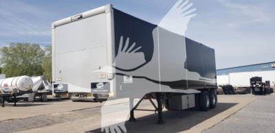 Trailer showing curtainside body of a 2015 Reitnouer Big Bubba with dual rear doors and landing gear, side graphics with white silhouettes of birds.
