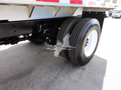 Freightliner M2 106 rear dual tires and chassis view showing leaf springs and wheel.