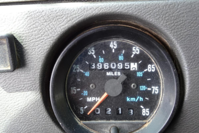 Mack RD690S gauge cluster showing speedometer with miles and analog odometer reading 396095, RPM indicator not visible, and various numbers around dial.