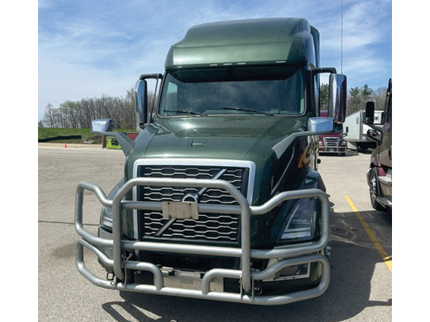 Volvo VNL 760 truck front view with protective front bumper guard and grille details.