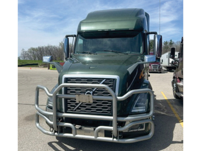 Volvo VNL 760 truck front view with protective front bumper guard and grille details.