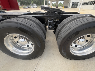 Peterbilt 579 tractor rear dual wheels showing tires and fifth wheel hitch connection