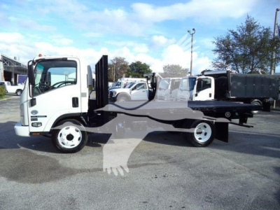 Isuzu NPR/NRR flatbed tow truck chassis in side view showing white cab and flatbed with wheel setup and hydraulic lines.