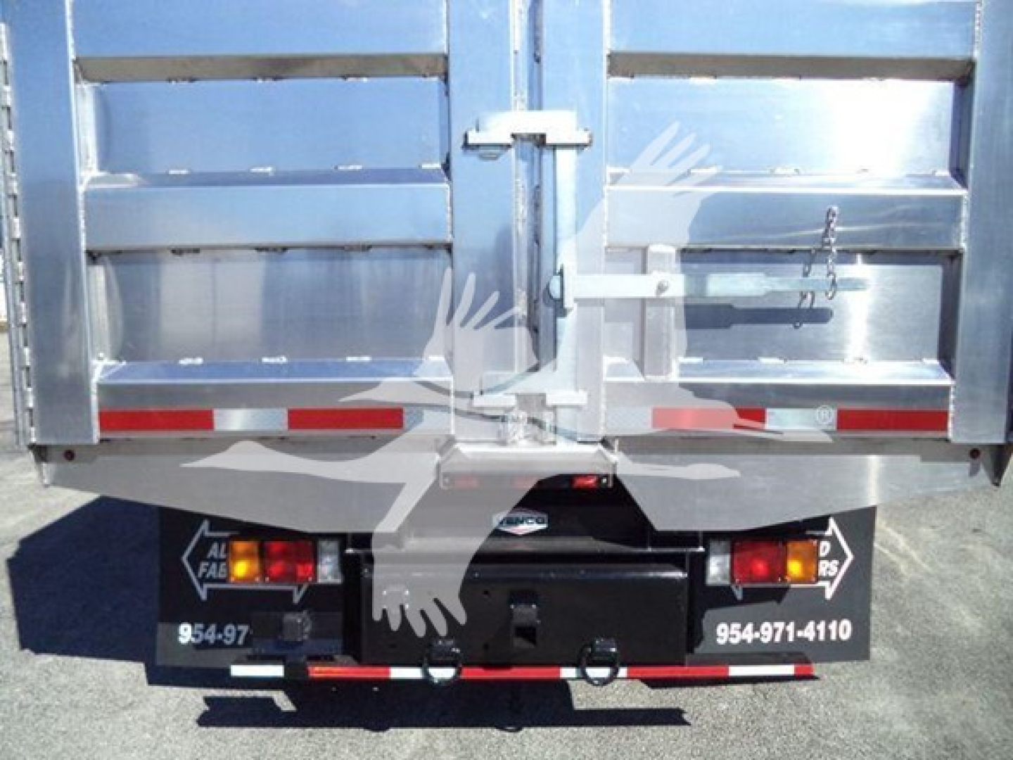 Isuzu NPR-HD rear view showing tailgate doors, bumper, and hitch with contact numbers visible.