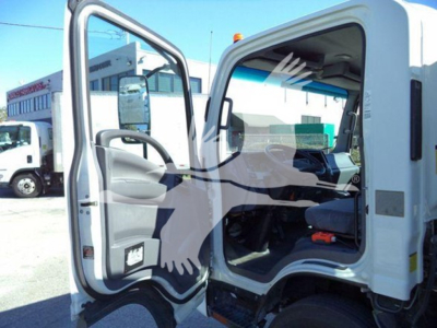 Isuzu NPR HD cab interior with open driver door showing steering wheel and dashboard