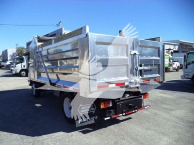 Isuzu NPR-HD dump truck rear view showing aluminum dump bed and taillights