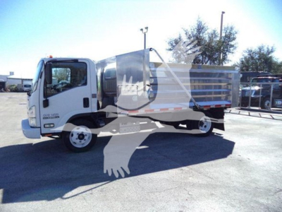 Isuzu NPR-HD dump truck in-service showing cab and dump body with metal panels; faint dealership watermark overlay across the image.