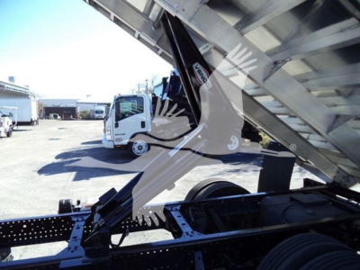 Isuzu NPR HD truck with unloading dump bed and hydraulic mechanism visible, side view showing chassis and wheels.