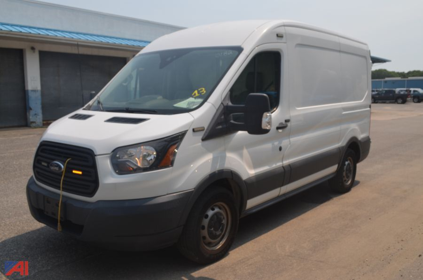 Ford Transit van with side profile, cargo van, white exterior, 2018 model year, in-service vehicle.