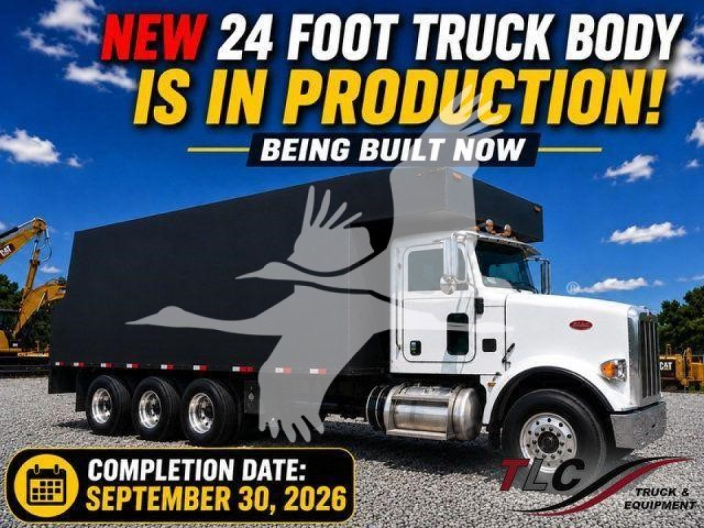 Peterbilt truck 367 grapple configuration with large black cargo box and white cab, advertisement overlay text in image.