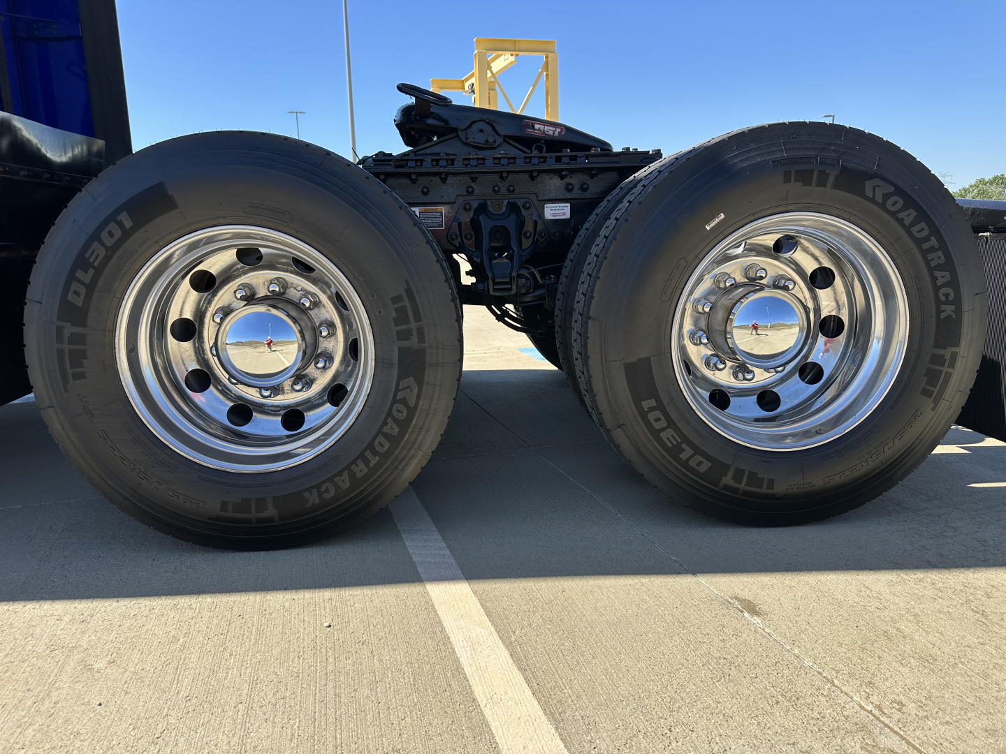 Kenworth T680 dual rear wheels and chassis showing heavy-duty trucks wheel rims and tires.
