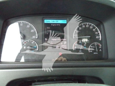 Dashboard cluster of a Freightliner M2 106 showing instrument gauges and a central digital display. Visible text includes Power Take Off 1/0, Engine RPM, 900, 1100, Customize, Engage PTO to Select, P, R, N, D indicators.