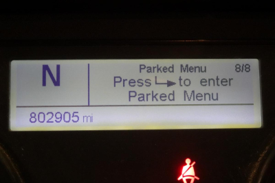Dashboard display from a 2017 Freightliner Cascadia 125 showing Parked Menu prompt, N gear, 802,905 miles, and a parked indicator.