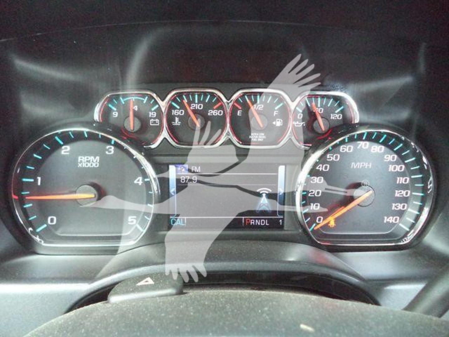 Dashboard cluster of a Chevrolet Silverado 6500HD showing multiple gauges and a digital display with PRNDL indicator