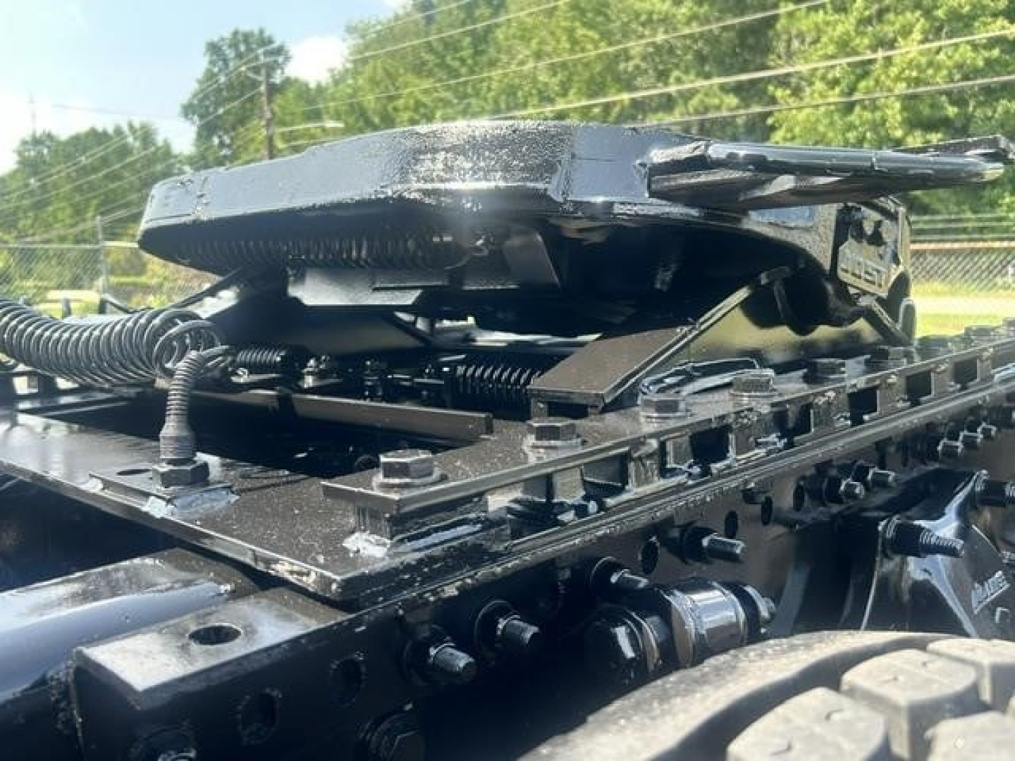Conventional sleeper truck 2022 Freightliner Cascadia 126 cab part with mounting rails and hydraulic mechanisms visible.