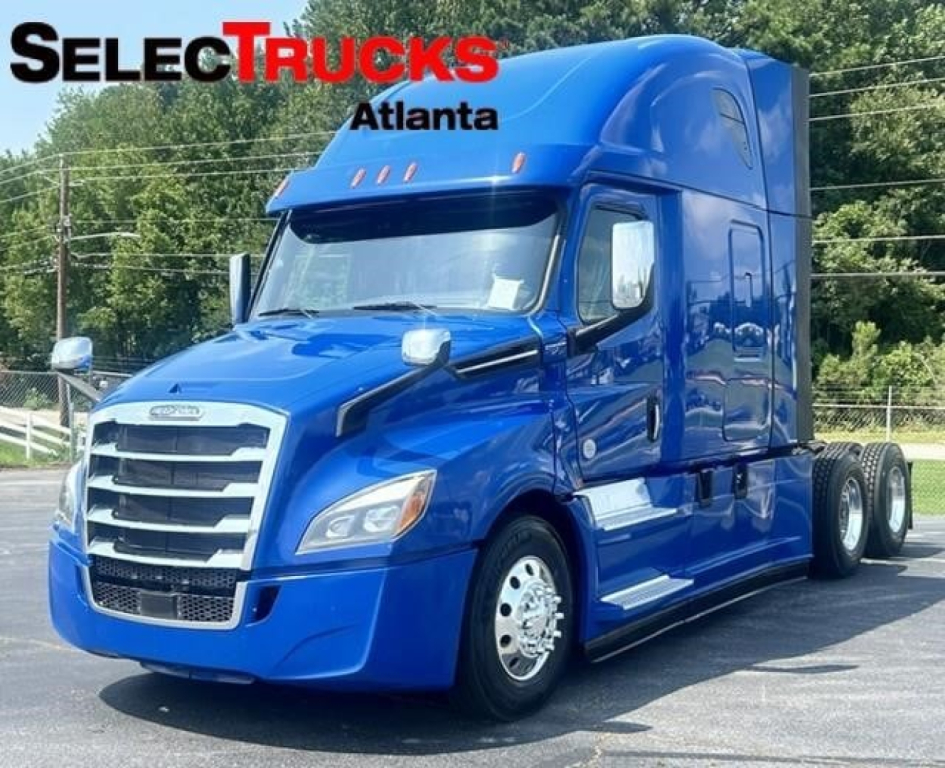 Freightliner Cascadia 126 sleeper cab in blue, front and side view with SelectTrucks Atlanta logo.