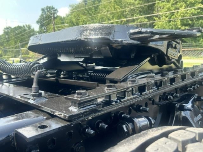 Conventional sleeper truck 2022 Freightliner Cascadia 126 cab part with mounting rails and hydraulic mechanisms visible.
