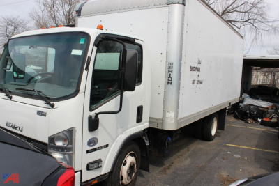 Isuzu box truck cab over engine with a white cargo box, side view, showing front cab and cargo area.