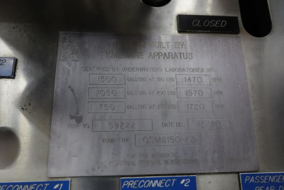 Plate on fire truck showing certification data: built by KME, multiple gallon ratings (1500, 1050, 7500) lbs, pump data fields, date 12/90, pump type QSMG150-23, serial 59322. Open/Closed indicator nearby.