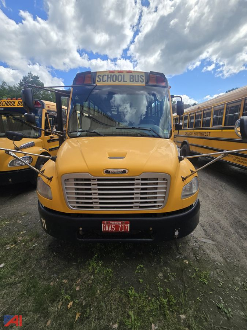 Front view of 2017 Freightliner B2 school bus showing yellow body, large grille, and 'SCHOOL BUS' sign on top.