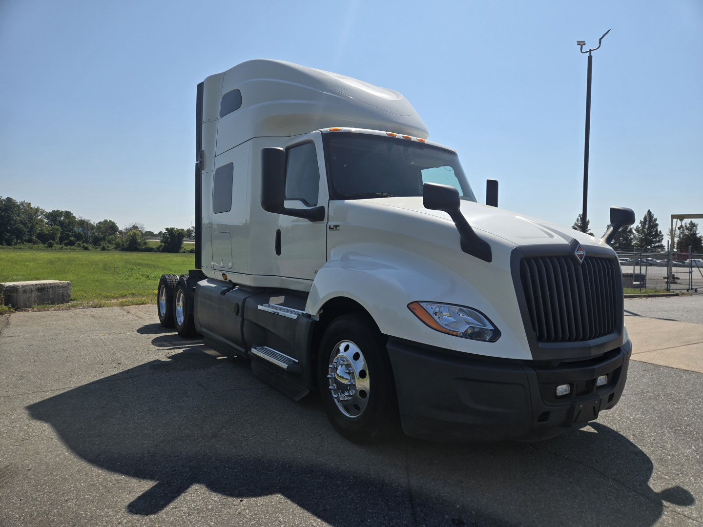 2021 International LT625 truck cab with sleeper, front-left view. Visible text may include no legible stickers in image.