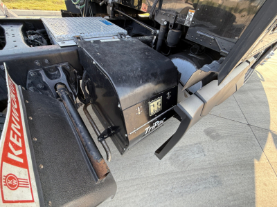 Kenworth T680 truck chassis showing toolbox and steps with RK logo and black metal components.