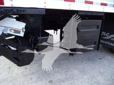 Isuzu FTR truck side view showing toolbox and chassis components.
