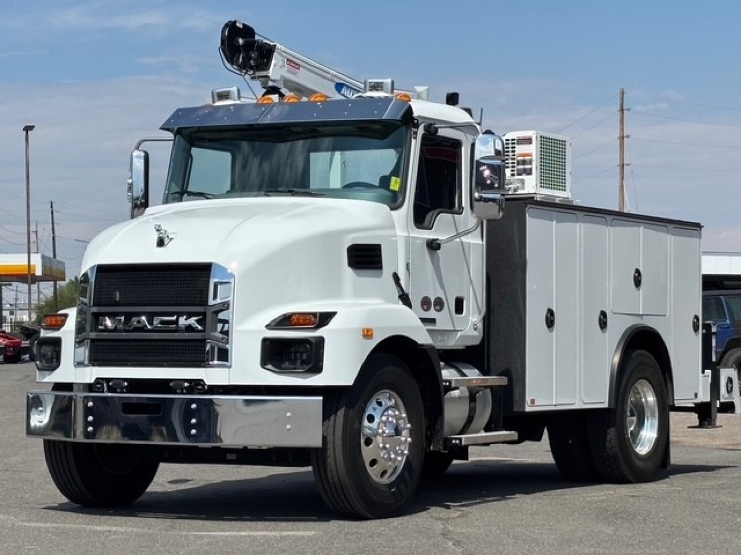 Mack MD6 service/utility truck showing front grille and utility compartments