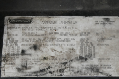 Freightliner Casadia 113 component information plate with model, engine, and axle details; shows 'Freightliner' logo and various specs including engine HP and RPM, transmission, and VIN partial data.