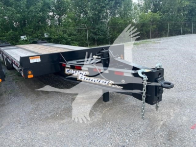 Trailer hitch and front portion of a 2026 Eager Beaver 20XPT trailer showing the hitch, chains, and Eager Beaver logo.