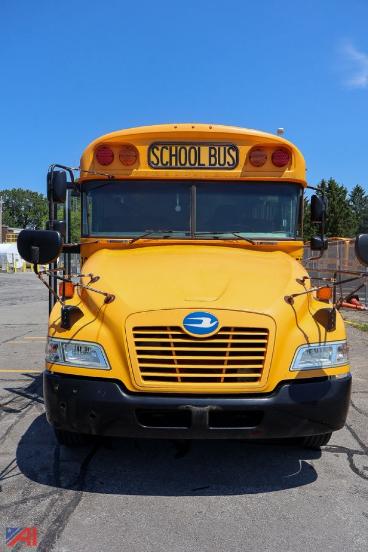 Front view of a yellow 2018 Blue Bird Vision school bus showing grille, headlights, and 'SCHOOL BUS' sign on top.