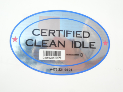 Oval Certified Clean Idle sticker with barcode on white surface.