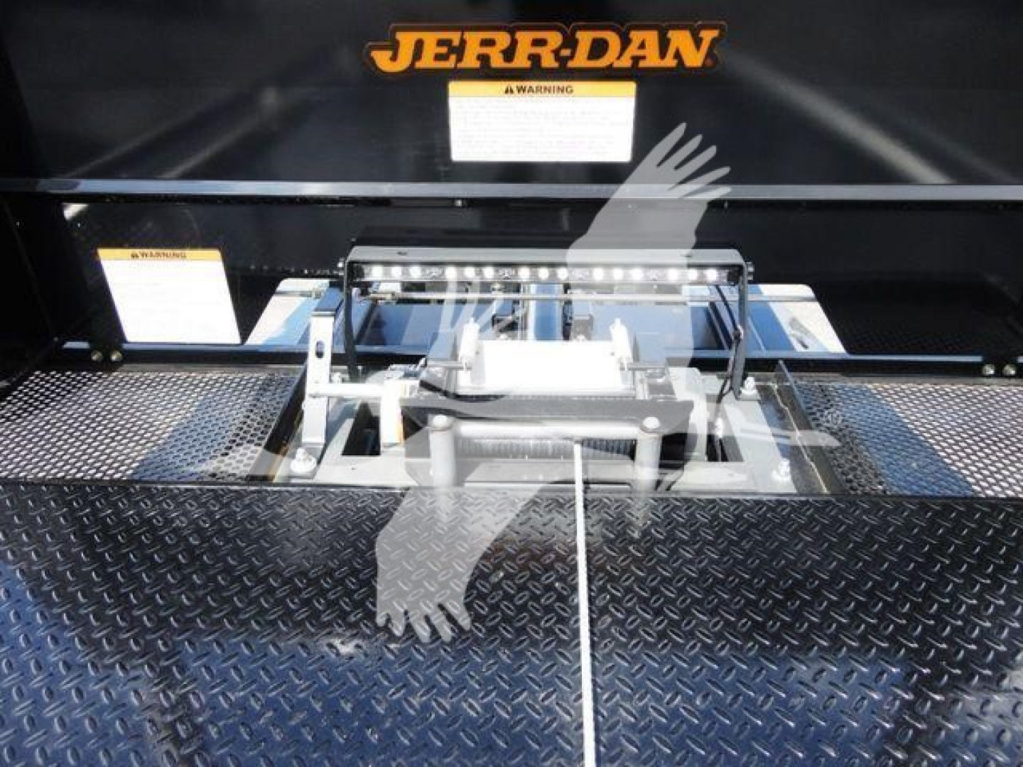Peterbilt 337 rollback truck deck with hydraulic winch and JERR-DAN branding on rear