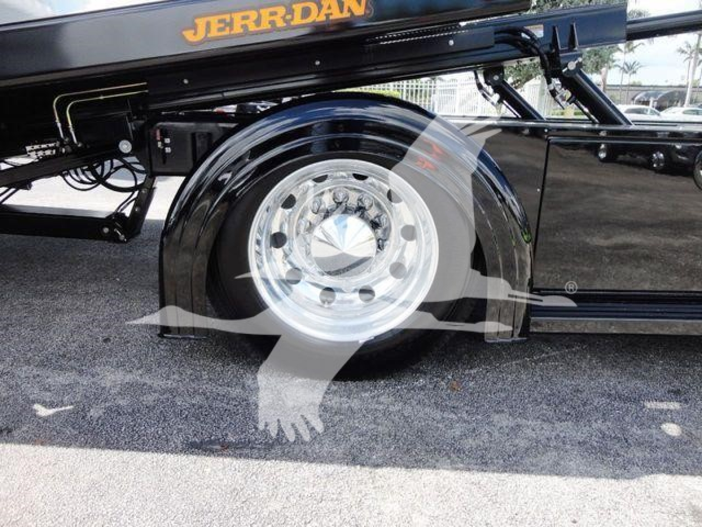 Peterbilt 337 rollback truck wheel and chassis with chrome wheel and black painted components.