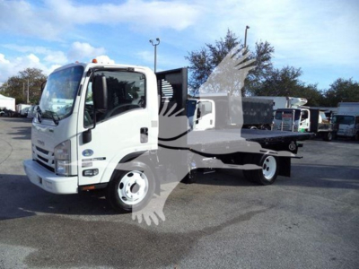Isuzu NRR flatbed truck in a dealership lot, white cab, flatbed body, VIN JALE5W161L7301786 visible in listing data.