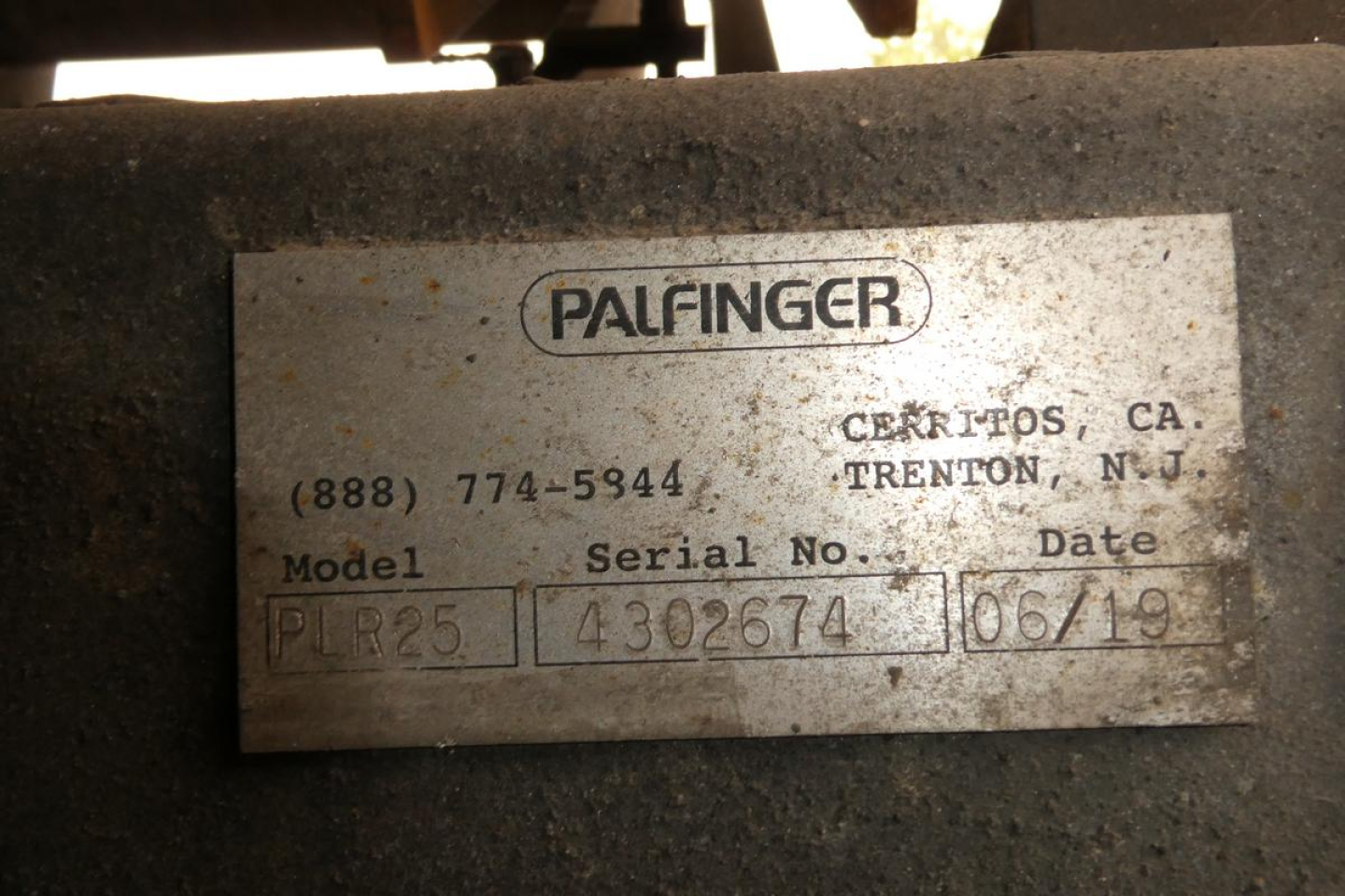 Plate label on Palfinger equipment showing model PR25 Serial No. 4302674 Date 06/19