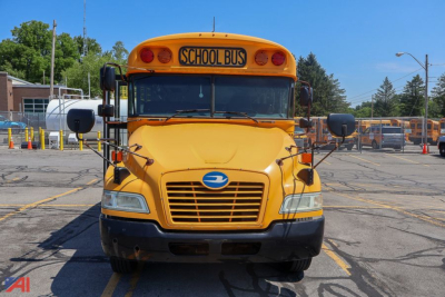 Front view of a 2017 Blue Bird Vision school bus in yellow with 'SCHOOL BUS' on top, black bumper, large windshield, and side mirrors.