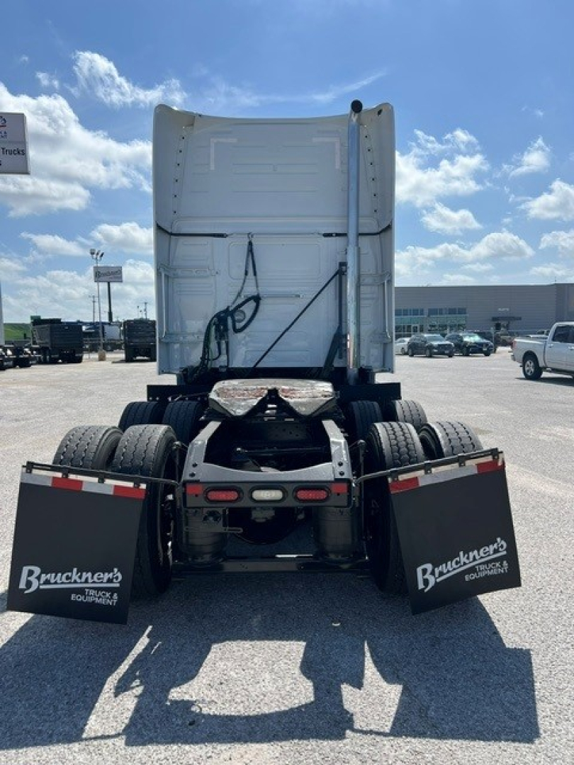Rear view of a 2020 Volvo VNL64T760 tractor showing dual rear axles and mud flaps with Buckner's Truck Equipment branding.