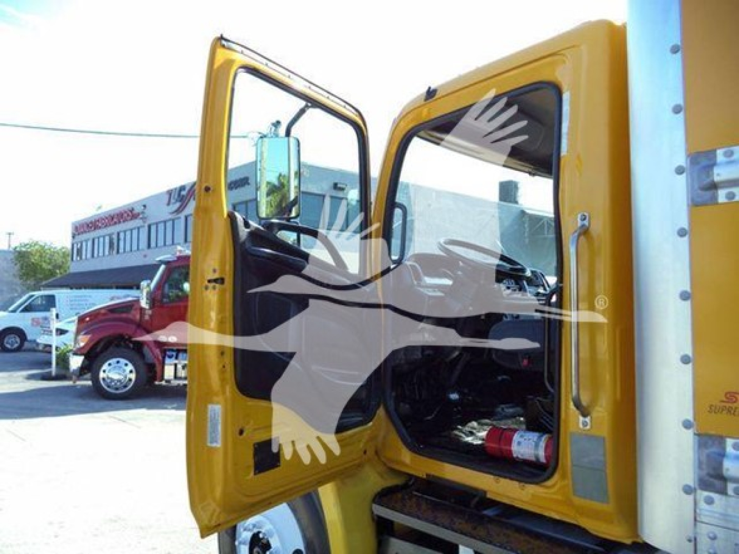2019 Hino 268A truck cab open showing interior and door.
